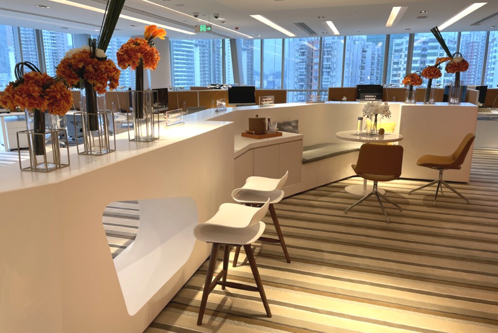 Reception & Lounge — curved joinery counter, breakout seating