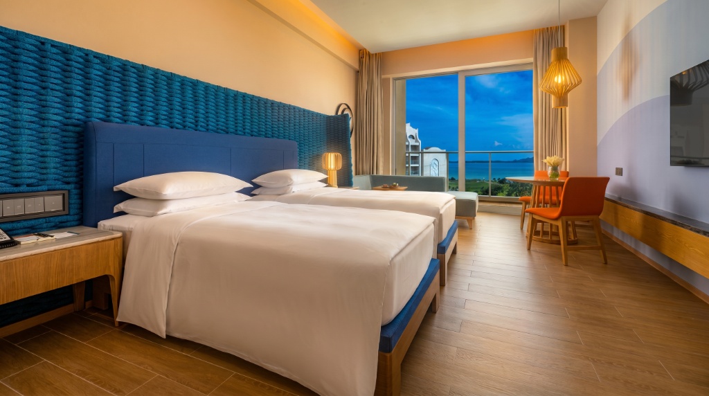 Deluxe Guest Room — bespoke headboard, timber furniture & sea view